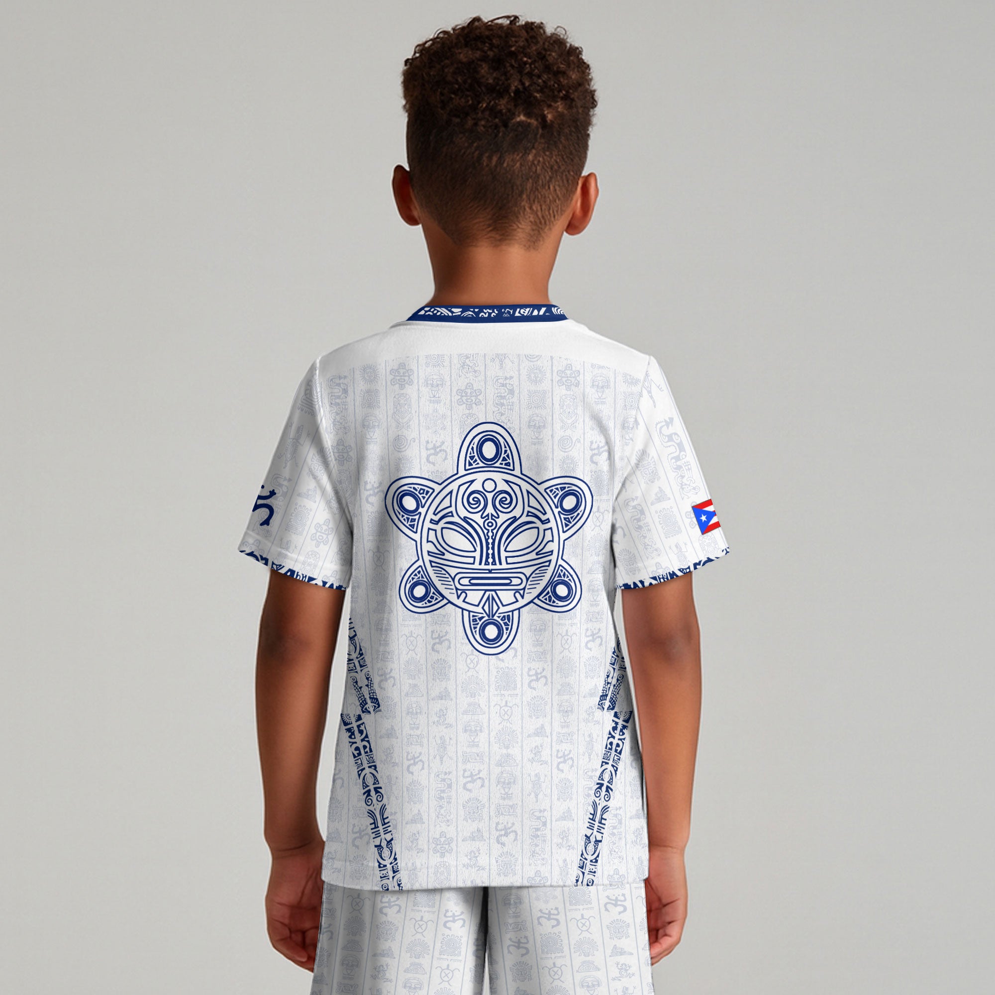 Camiseta de fútbol juvenil blanca y azul del Sol Taino de Puerto Rico, patrimonio nacional, arte boricua