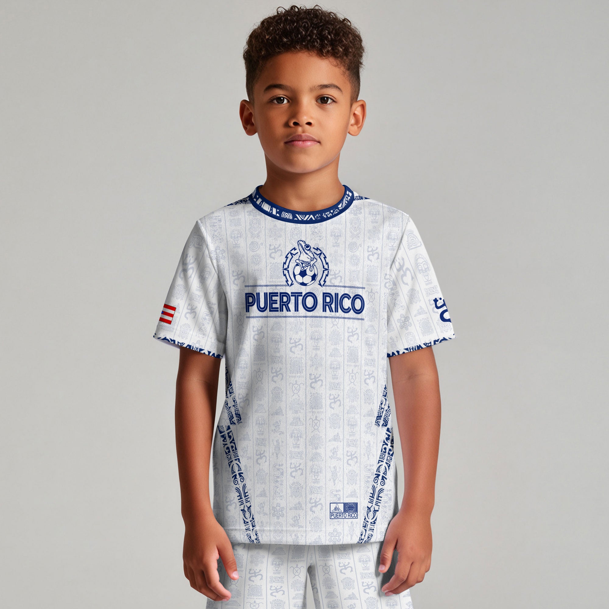 Camiseta de fútbol juvenil blanca y azul del Sol Taino de Puerto Rico, patrimonio nacional, arte boricua